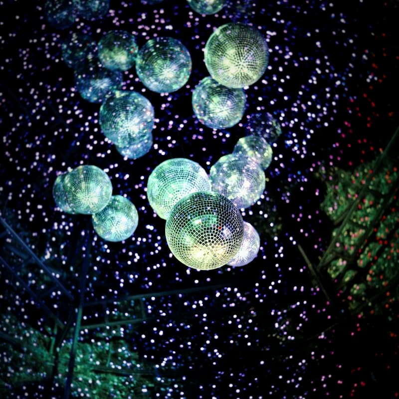 Disco balls hanging and catching the light