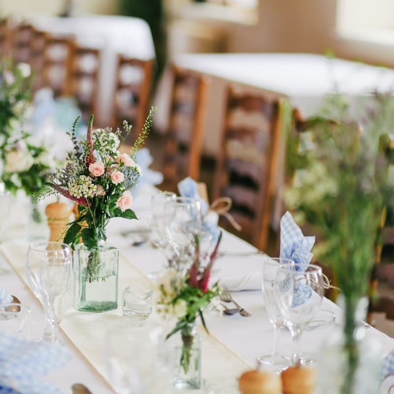 Wine glasses set out on a reception table
